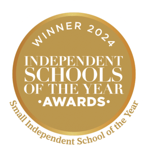 Gold circular badge with white border, text reads "Winner 2024 Independent Schools of the Year Awards" with "Small Independent School of the Year" at the bottom.